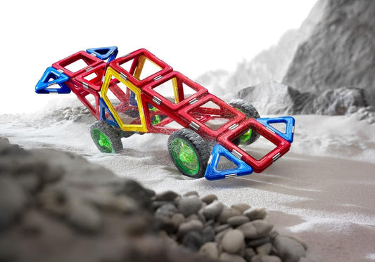 "A fully assembled GeoSmart RoboRacer, featuring colorful magnetic geometric pieces and a motorized mechanism, designed for STEM learning and creative construction