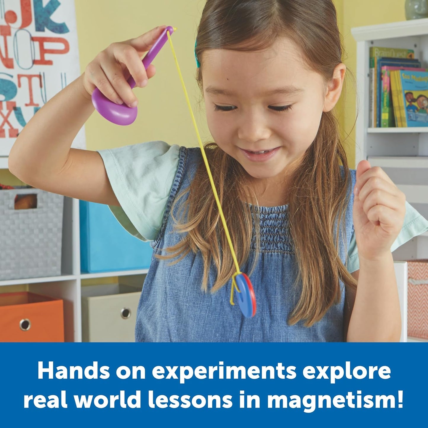 Young girl playing with the Learning Resources STEM Explorers Magnet Movers Set. Hands-on experiments explore real-world lessons in magnetism, building STEM skills through interactive play.
