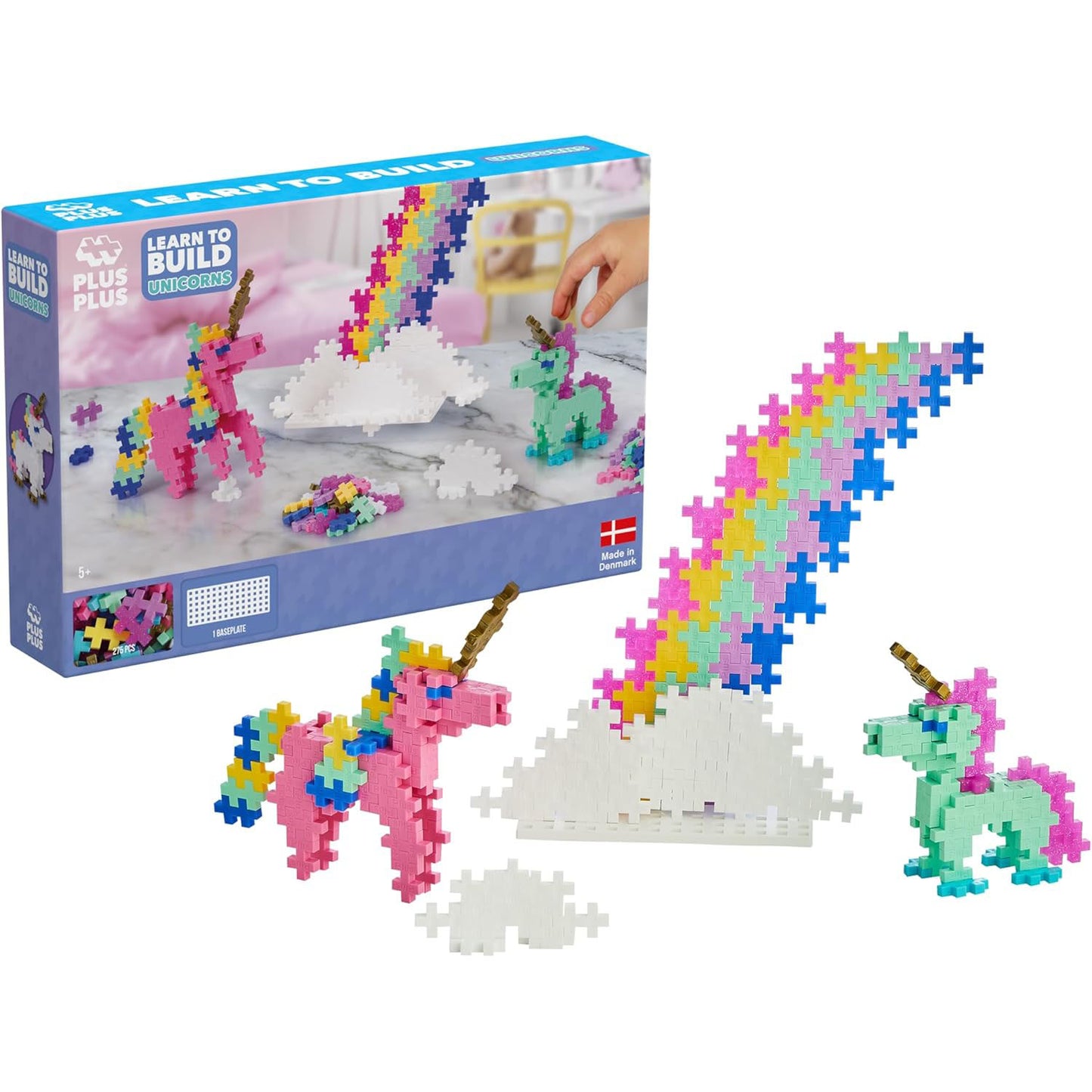 "The Plus-Plus Learn to Build Unicorns box with two coloruful unicorn models and a rainbow, built from 275 interlocking pieces for creative play.