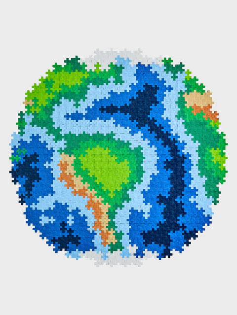 "A completed Plus-Plus Puzzle By Number Earth mosaic, built from 800 colourful interlocking pieces, showcasing a great STEM activity for creativity and fine motor skills.