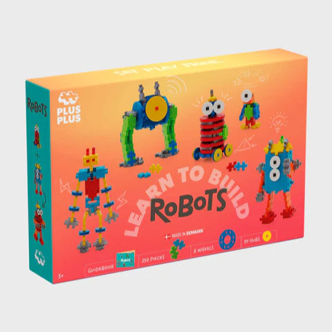 The front of the Plus-Plus Learn to Build Robots box, featuring vibrant illustrations of robot models and highlighting the 275-piece STEAM learning set.