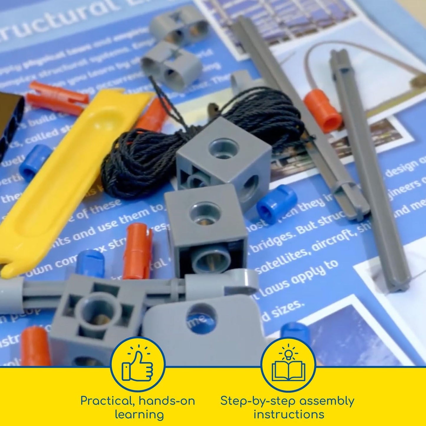 Thames & Kosmos Structural Engineering kit parts placed on top of the instruction manual. Hands-on STEM learning with step-by-step guidance for building bridges and skyscrapers