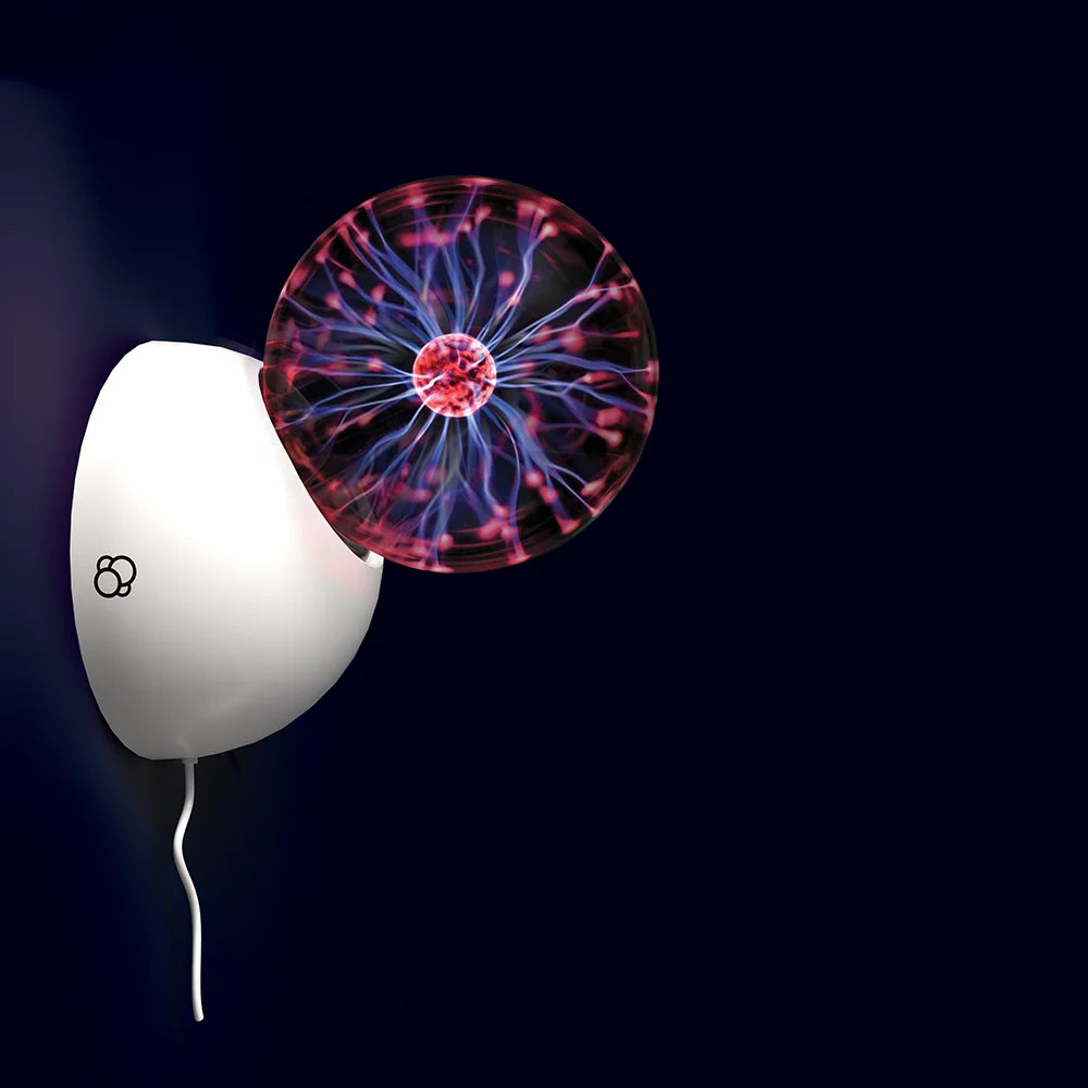 Thames & Kosmos Plasma Ball mounted on a wall. Electric arcs pulse and react to touch, creating a mesmerizing glow in a darkened space.