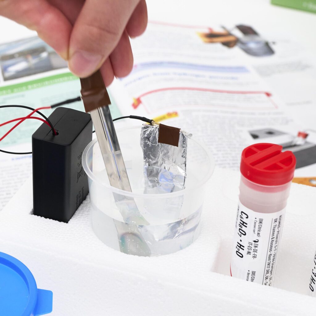 Thames & Kosmos Chemistry C1000 Set experiment in progress. Hands-on STEM learning with real chemistry reactions, perfect for young scientists exploring science safely.