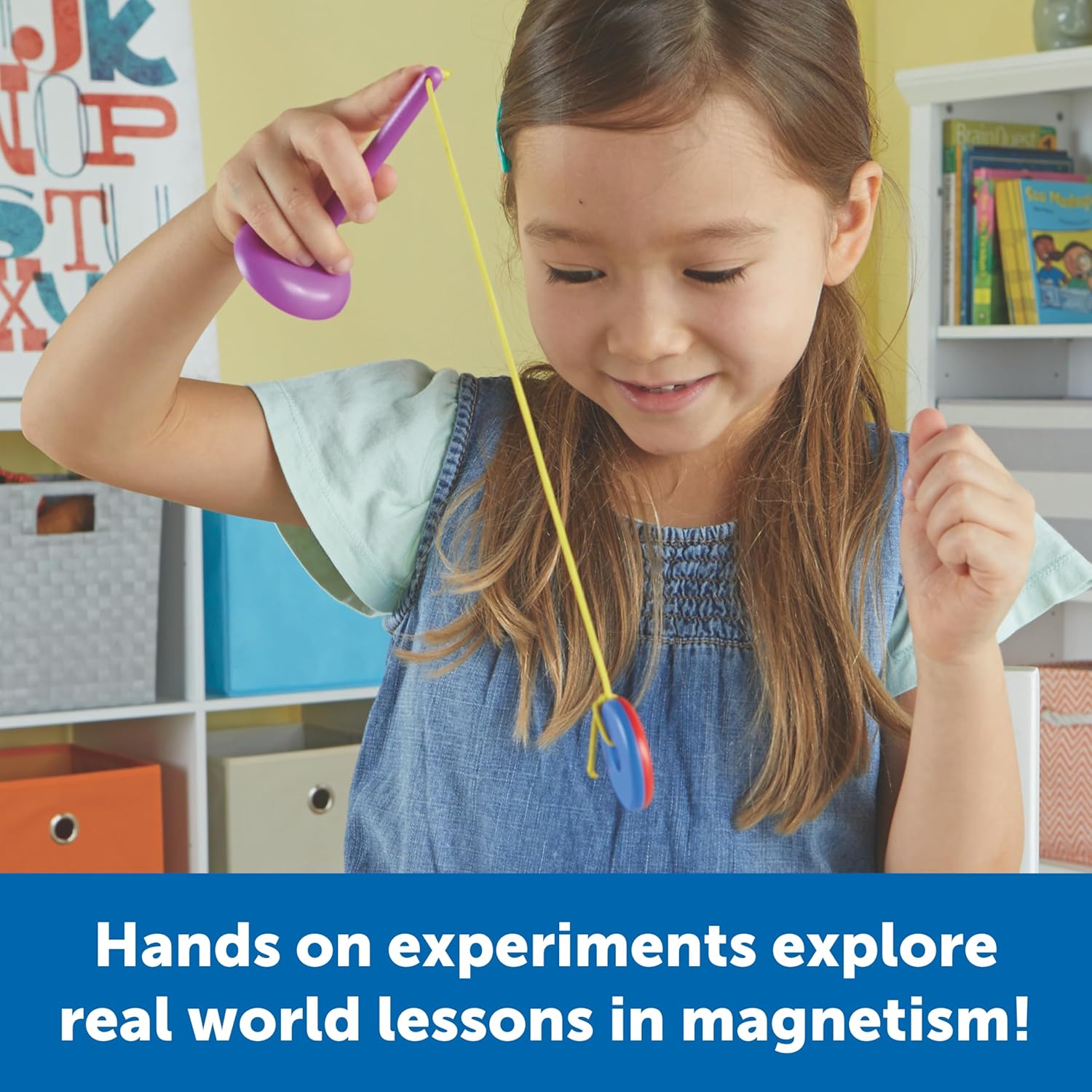 Young girl playing with the Learning Resources STEM Explorers Magnet Movers Set. Hands-on experiments explore real-world lessons in magnetism, building STEM skills through interactive play.
