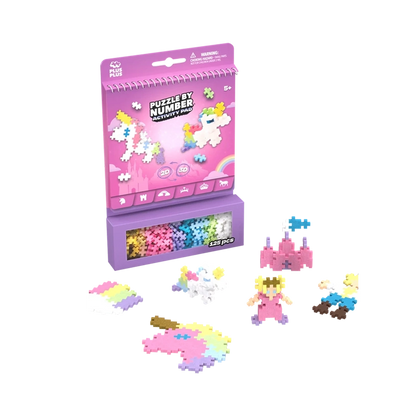 The front of the Plus-Plus Fairies & Unicorns Activity Pad, featuring colourful illustrations of fairies, unicorns, and castles, highlighting the 125-piece creative building set.