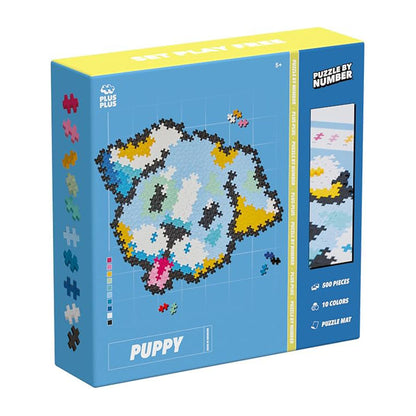 A Plus-Plus Puzzle By Number Puppy set with 500 colourful interlocking pieces, featuring a numbered template to build an adorable puppy model.