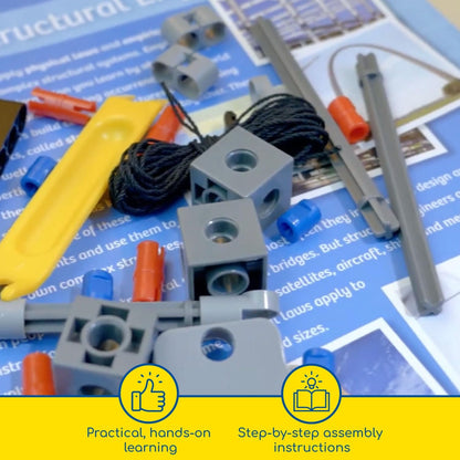 Thames & Kosmos Structural Engineering kit parts placed on top of the instruction manual. Hands-on STEM learning with step-by-step guidance for building bridges and skyscrapers